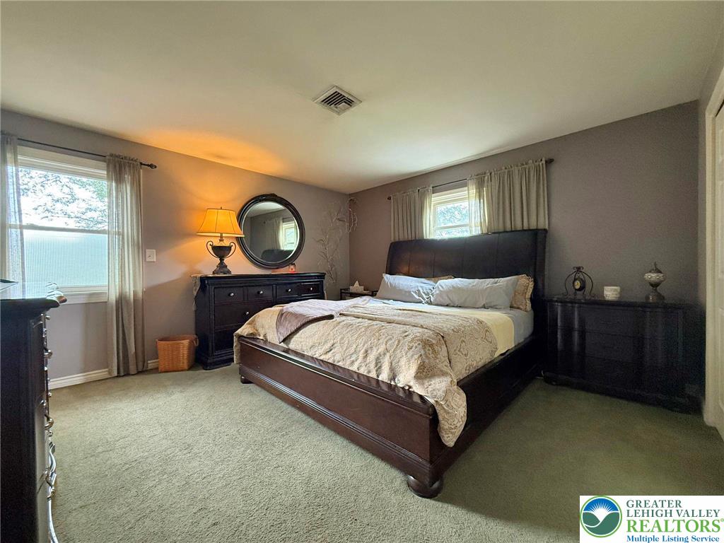 2507 Rachael Lane Orefield, PA 18069 - Photo 22 of 42 a bedroom with a bed and a closet