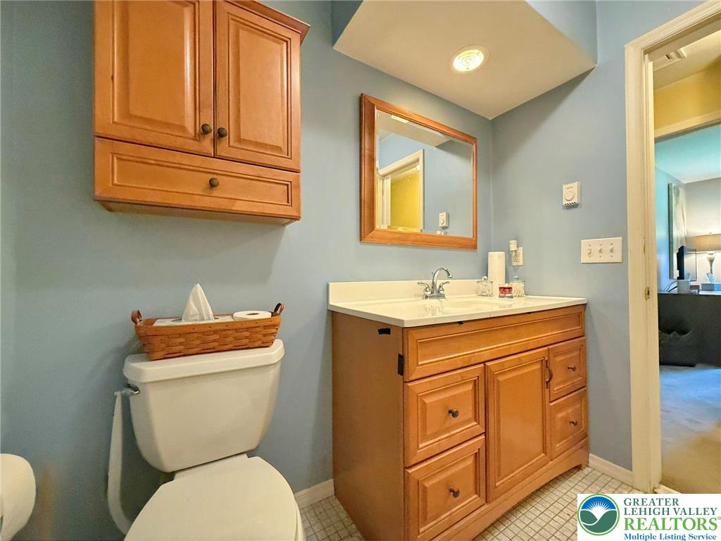 2507 Rachael Lane Orefield, PA 18069 - Photo 23 of 53 a bathroom with a toilet sink and mirror