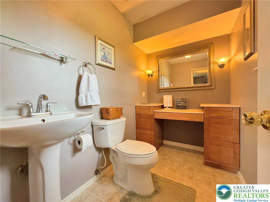 2507 Rachael Lane Orefield, PA 18069 - Photo 30 of 53 a bathroom with a sink toilet and mirror