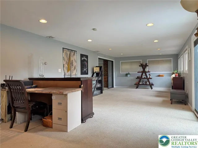 a living room with furniture and a table