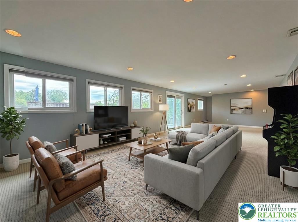 2507 Rachael Lane Orefield, PA 18069 - Photo 39 of 53 a living room with furniture and a flat screen tv