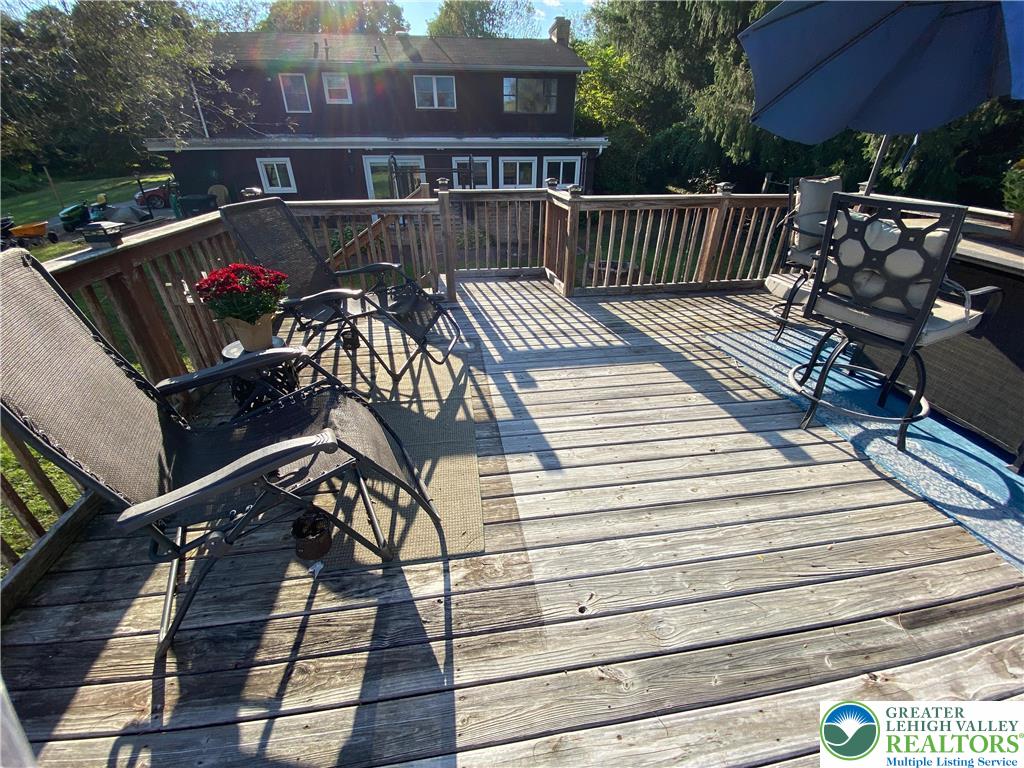 2507 Rachael Lane Orefield, PA 18069 - Photo 41 of 42 a view of a roof deck with wooden floor and fence