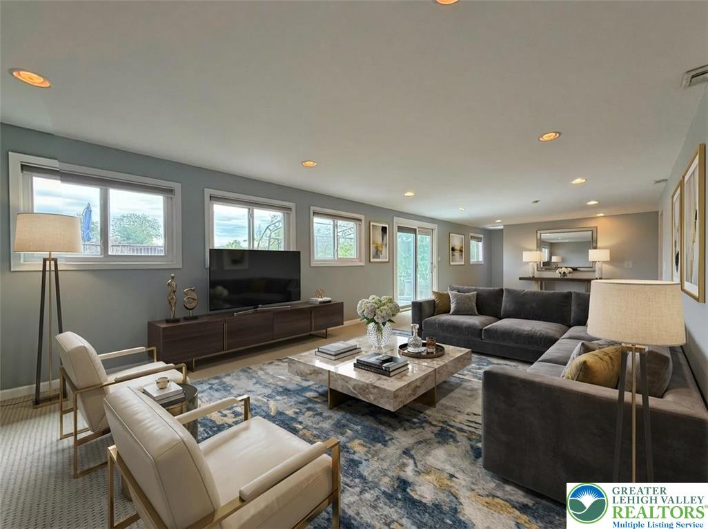 2507 Rachael Lane Orefield, PA 18069 - Photo 43 of 53 a living room with furniture and a flat screen tv