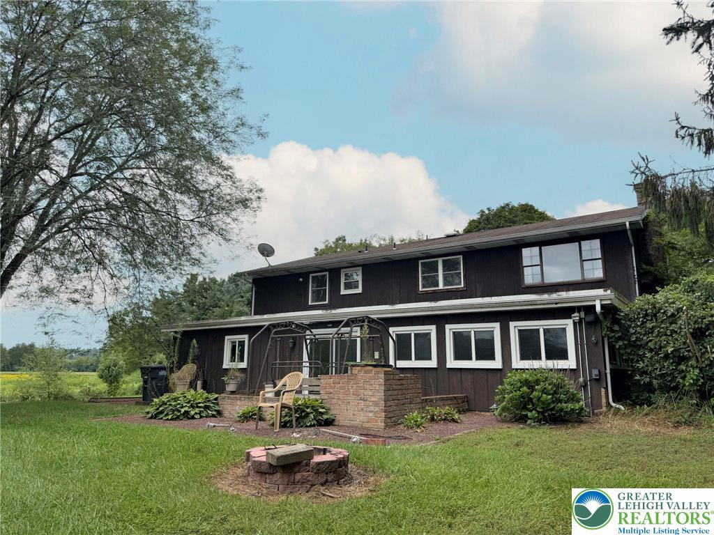 2507 Rachael Lane Orefield, PA 18069 - Photo 45 of 53 a front view of a house with garden and trees