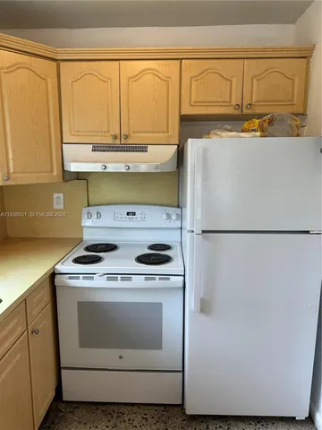 a bathroom with a sink and a window