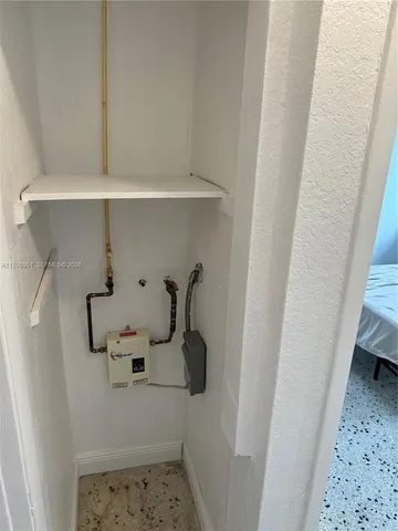 a bathroom with a sink and mirror