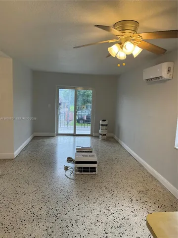 a kitchen with a refrigerator sink and a window