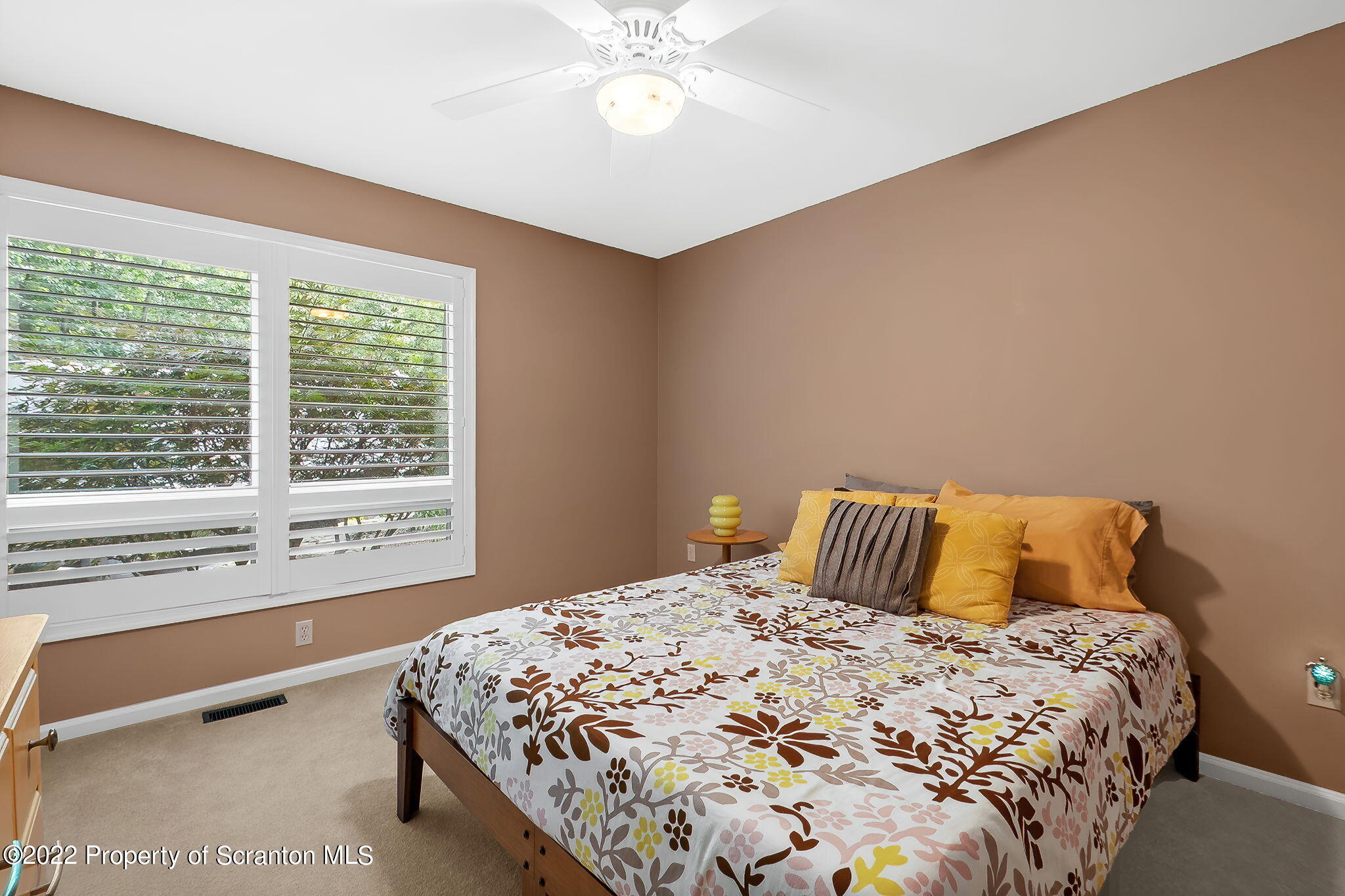 773 Greens Dallas, PA 18612 - Photo 12 of 44 a bedroom with a large bed and a large window