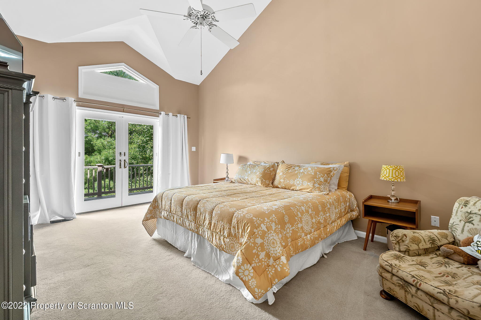 773 Greens Dallas, PA 18612 - Photo 17 of 44 a spacious bedroom with a bed and a couch