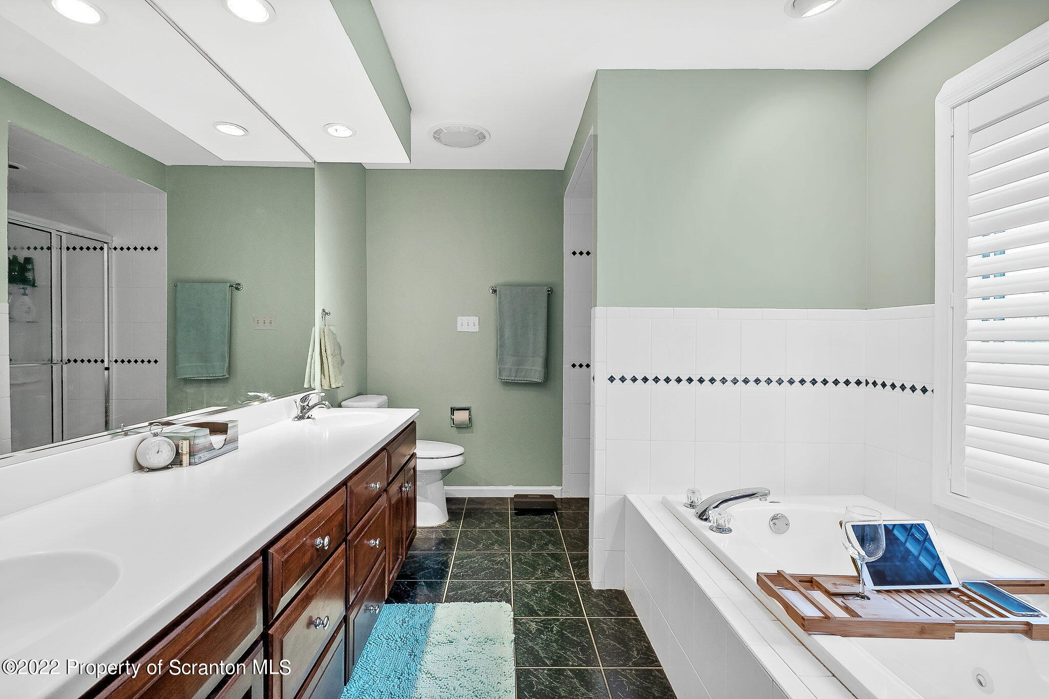 773 Greens Dallas, PA 18612 - Photo 20 of 44 a spacious bathroom with a tub sink and mirror
