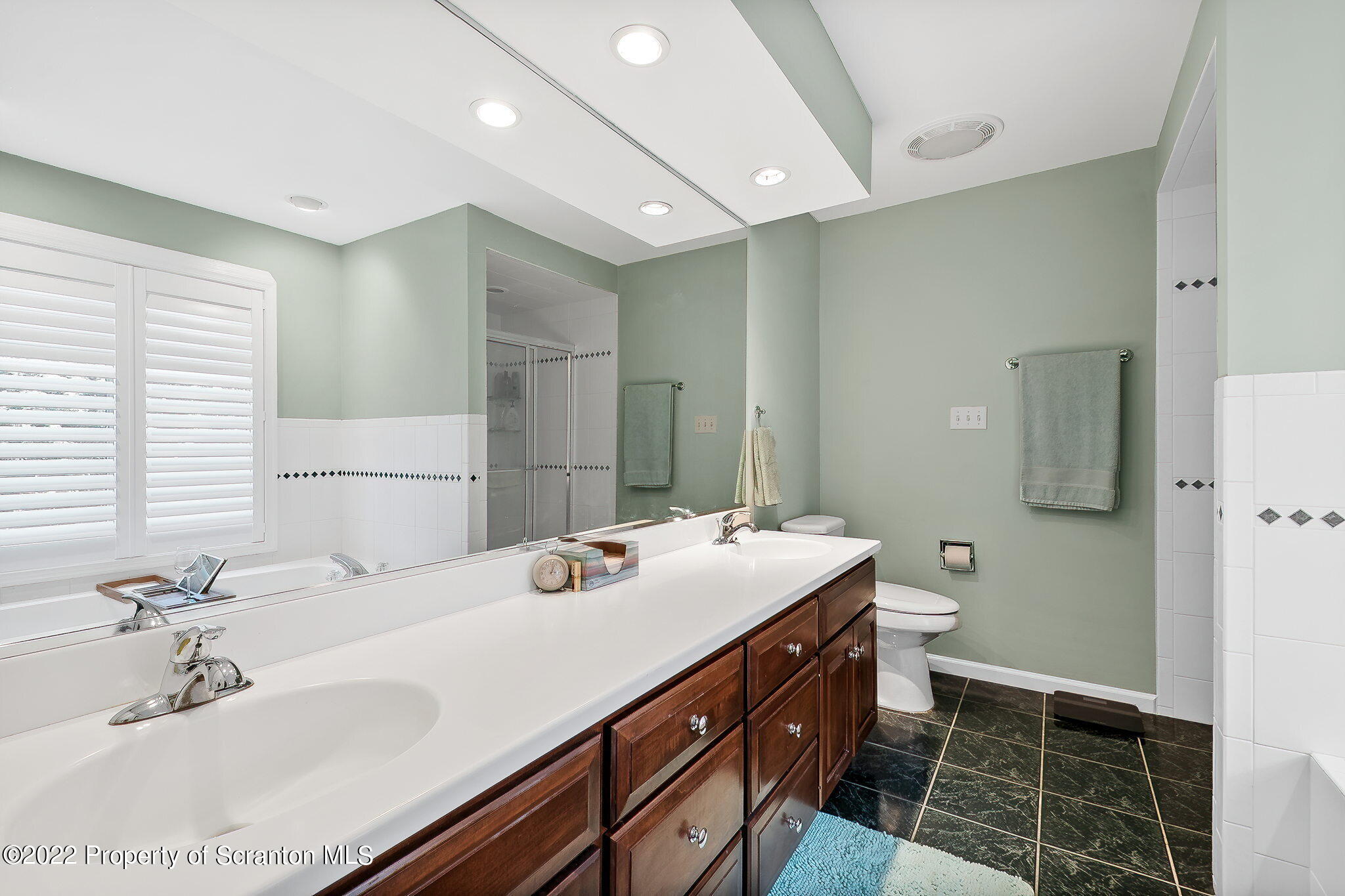 773 Greens Dallas, PA 18612 - Photo 21 of 44 a bathroom with a double vanity sink mirror and toilet