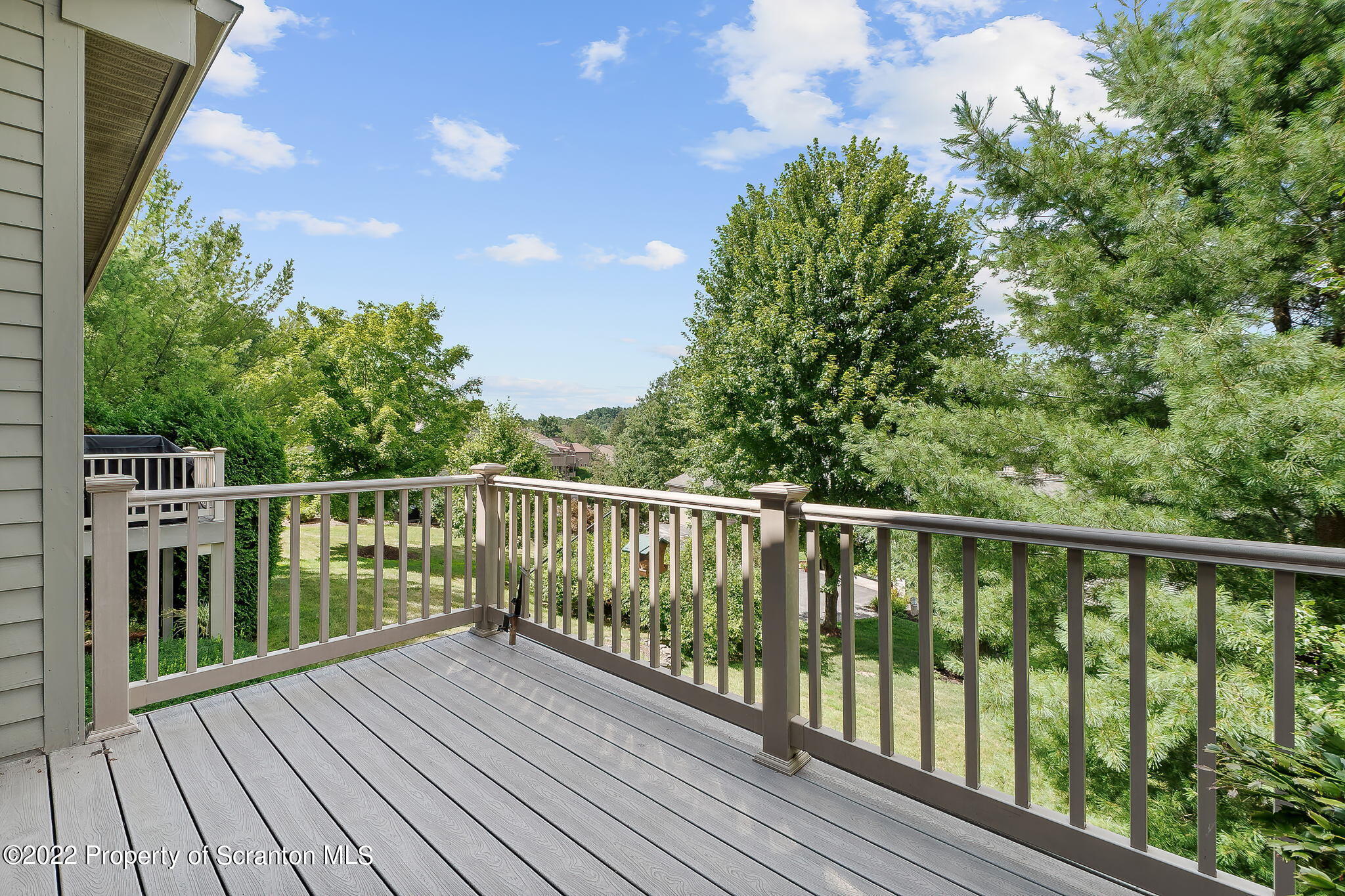 773 Greens Dallas, PA 18612 - Photo 23 of 44 a balcony with wooden floor and fence