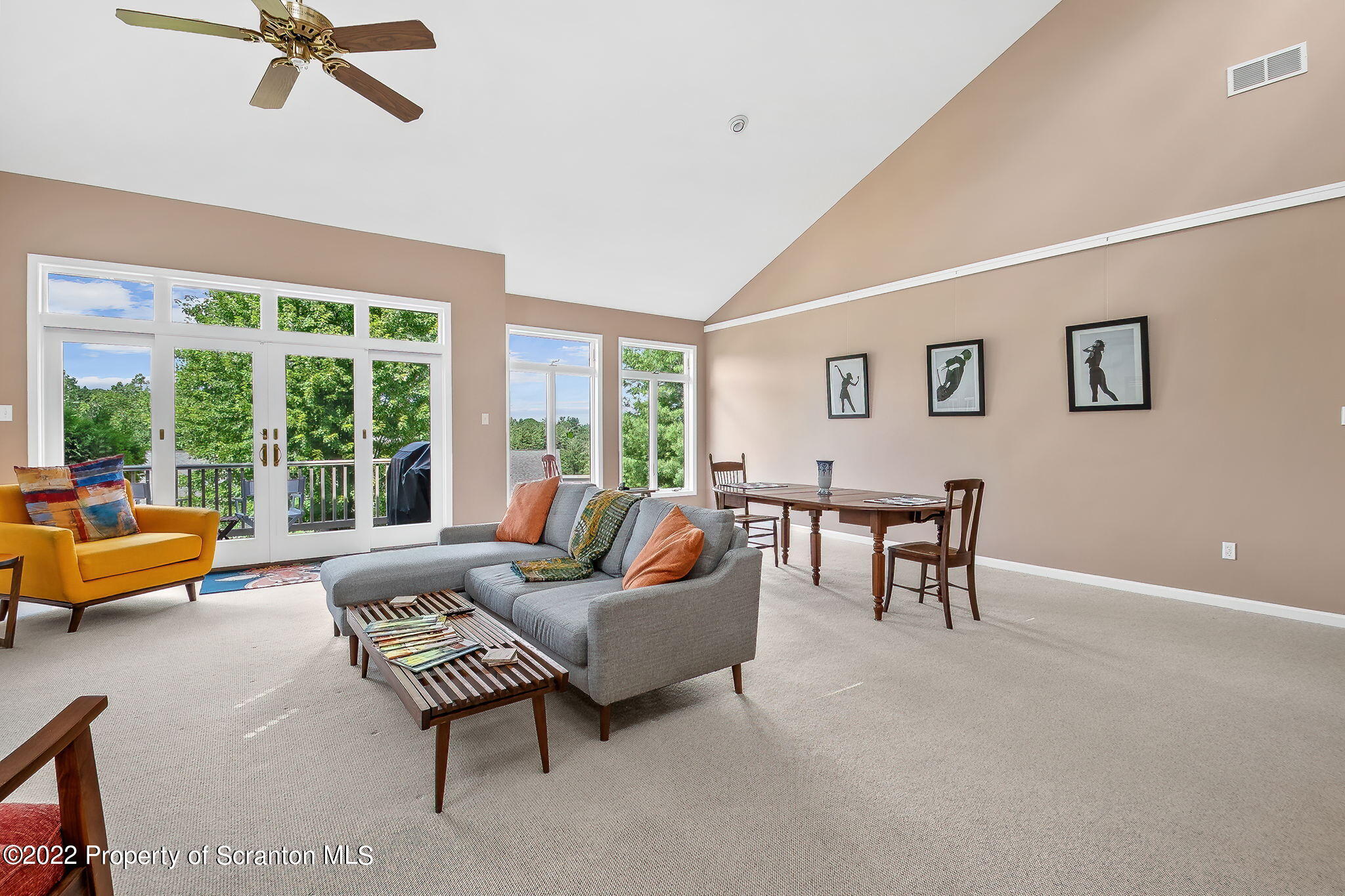 773 Greens Dallas, PA 18612 - Photo 3 of 44 a living room with furniture and a floor to ceiling window