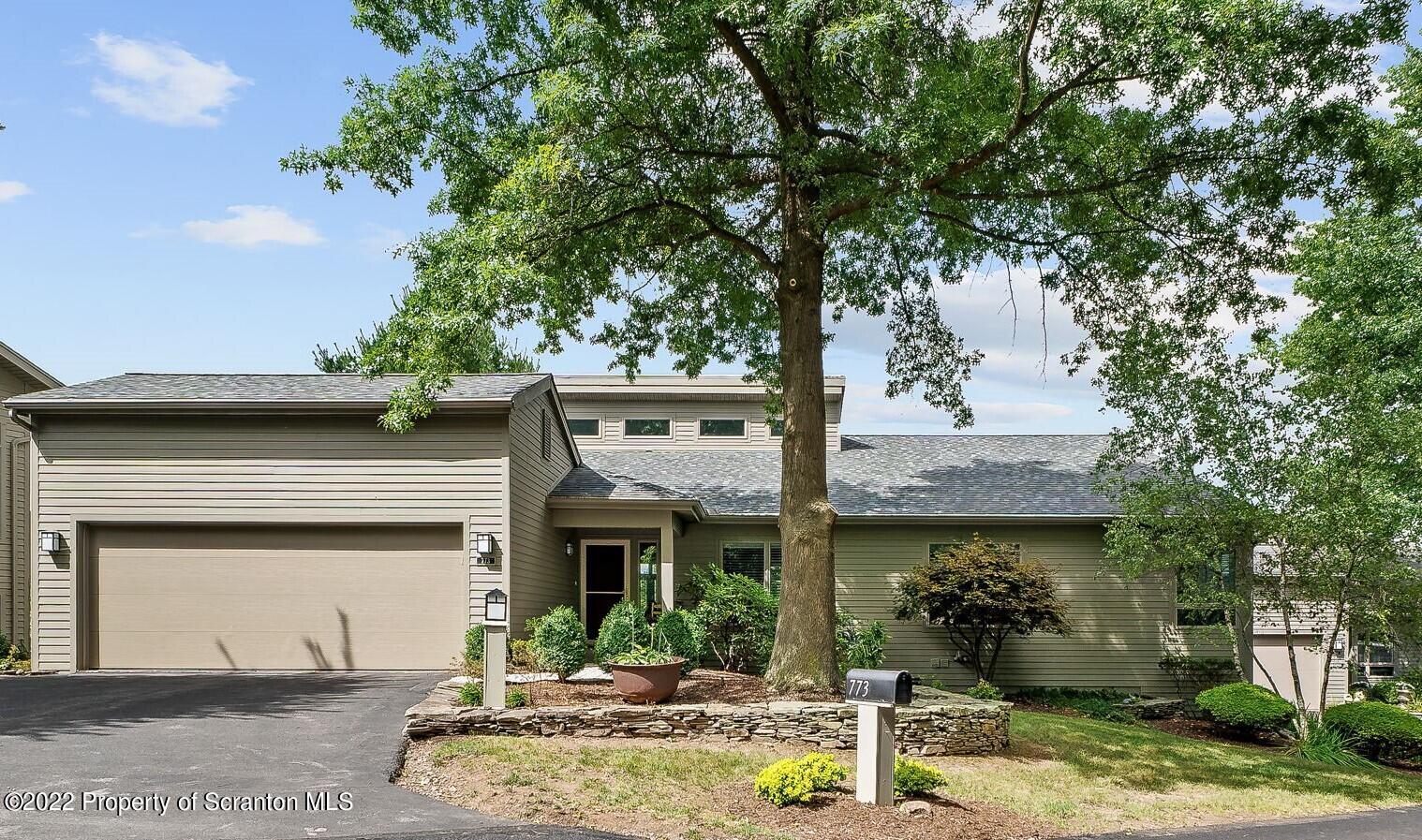 773 Greens Dallas, PA 18612 - Photo 40 of 44 a front view of a house with garden
