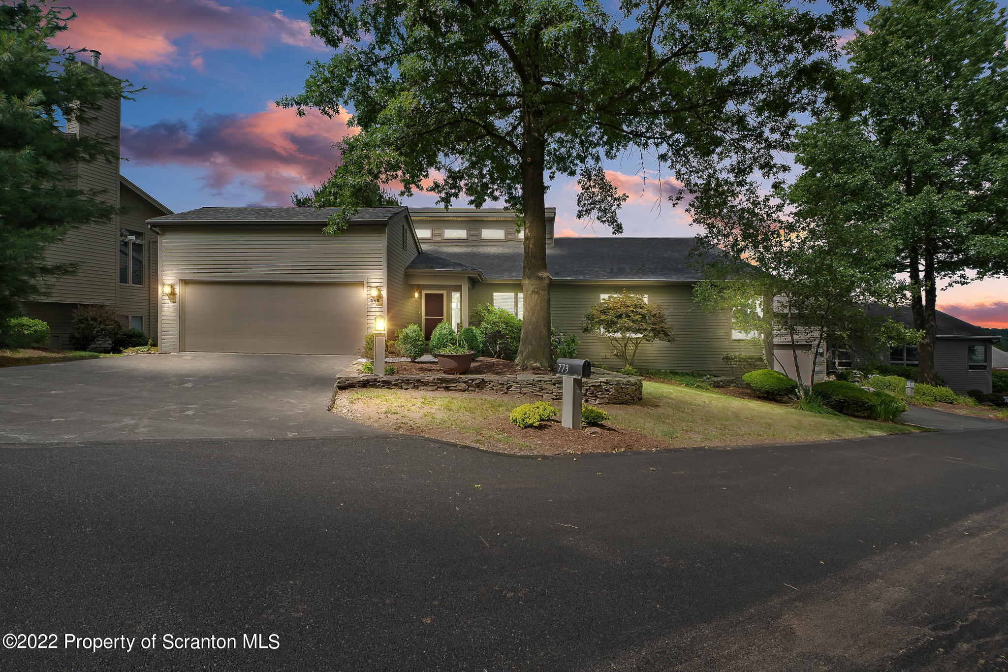 773 Greens Dallas, PA 18612 - Photo 41 of 44 a view of a house with a patio