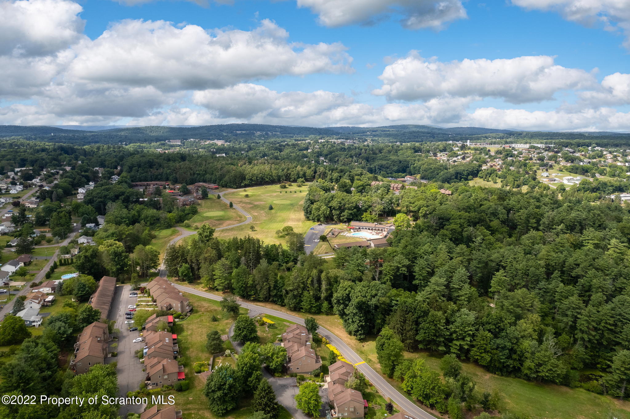 773 Greens Dallas, PA 18612 - Photo 43 of 44 an aerial view of residential houses with outdoor space and trees