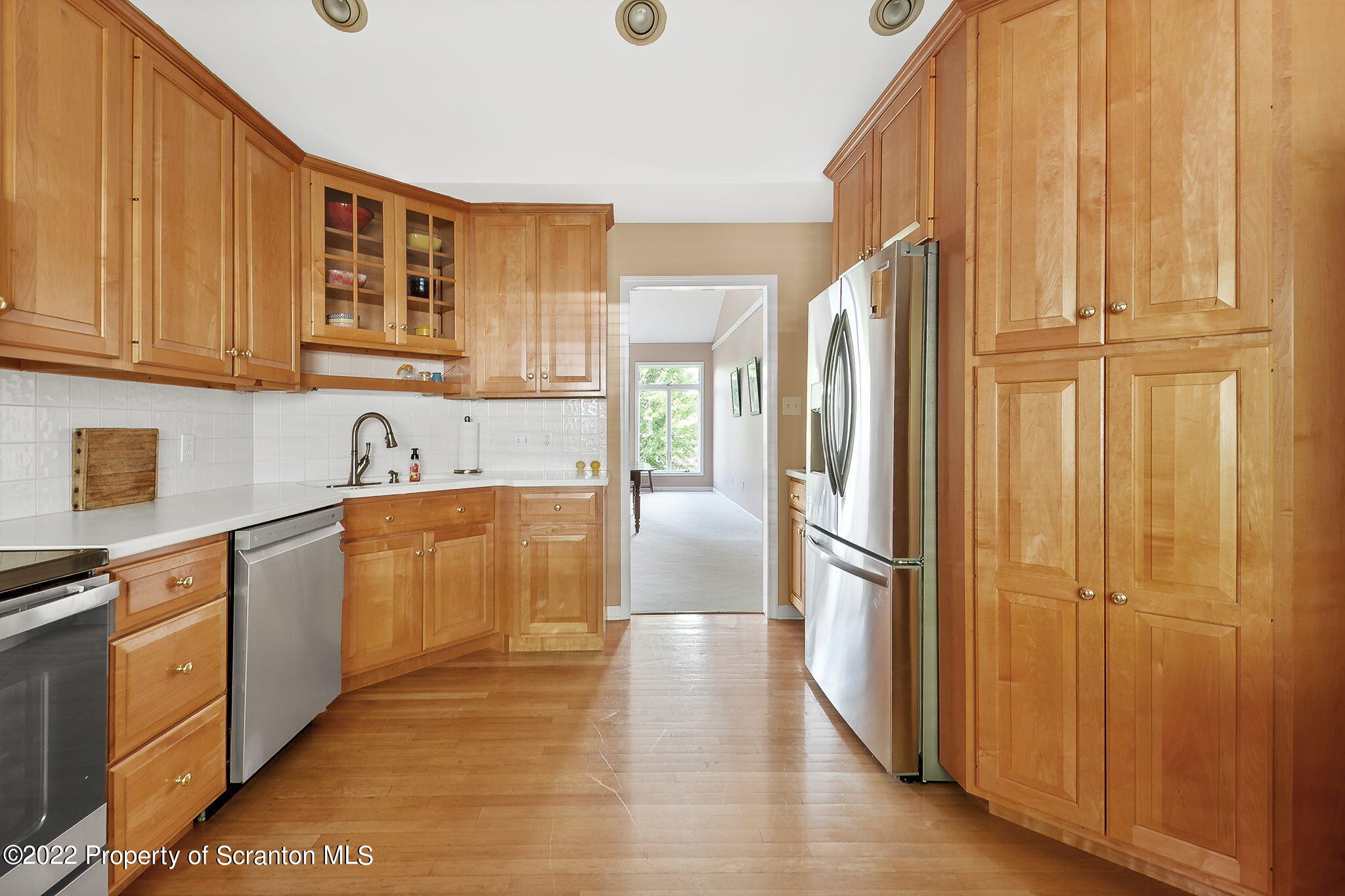773 Greens Dallas, PA 18612 - Photo 6 of 44 a kitchen with stainless steel appliances granite countertop a refrigerator and a stove top oven