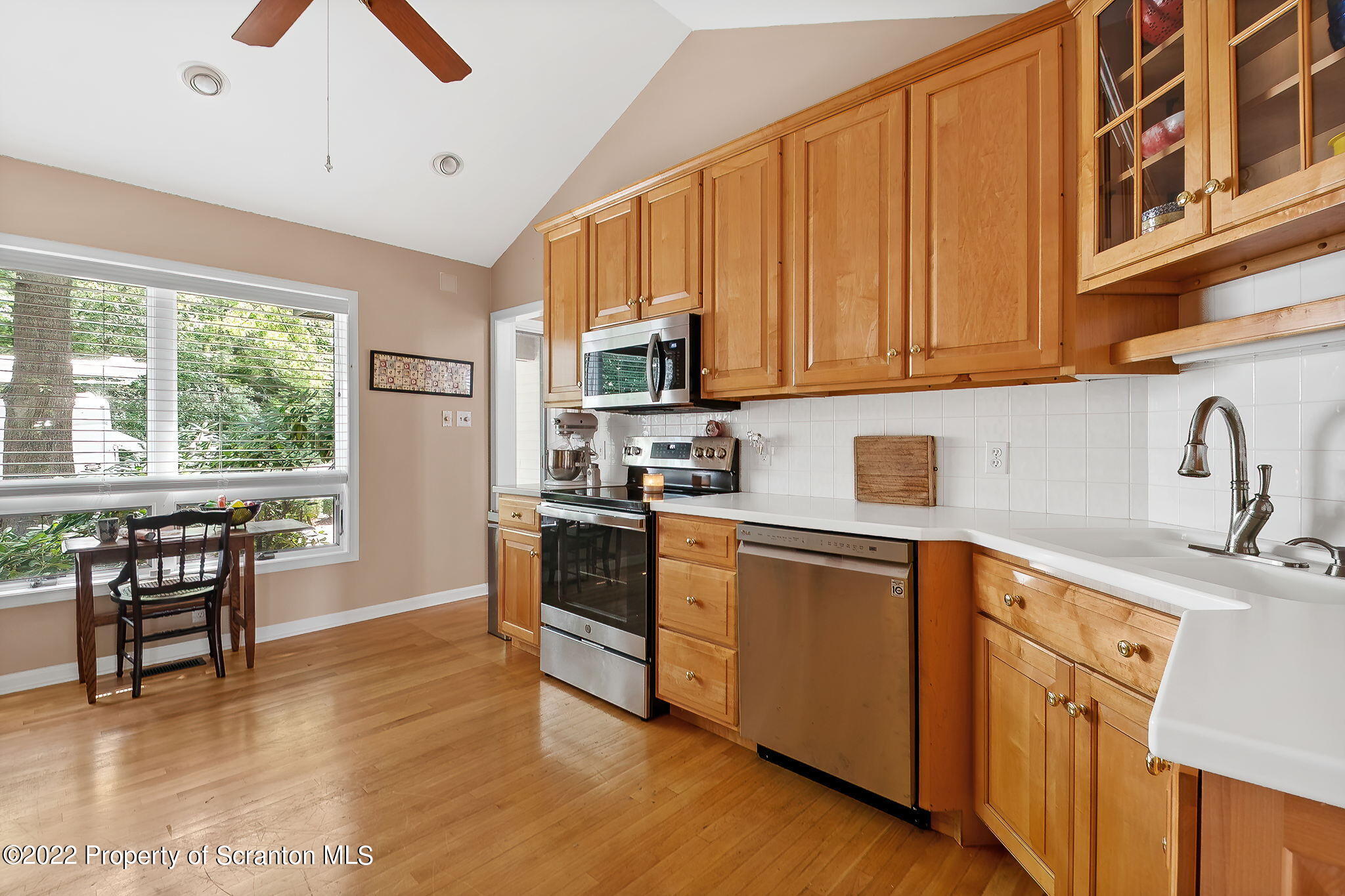 773 Greens Dallas, PA 18612 - Photo 8 of 44 a kitchen with stainless steel appliances granite countertop a stove a sink dishwasher and a refrigerator