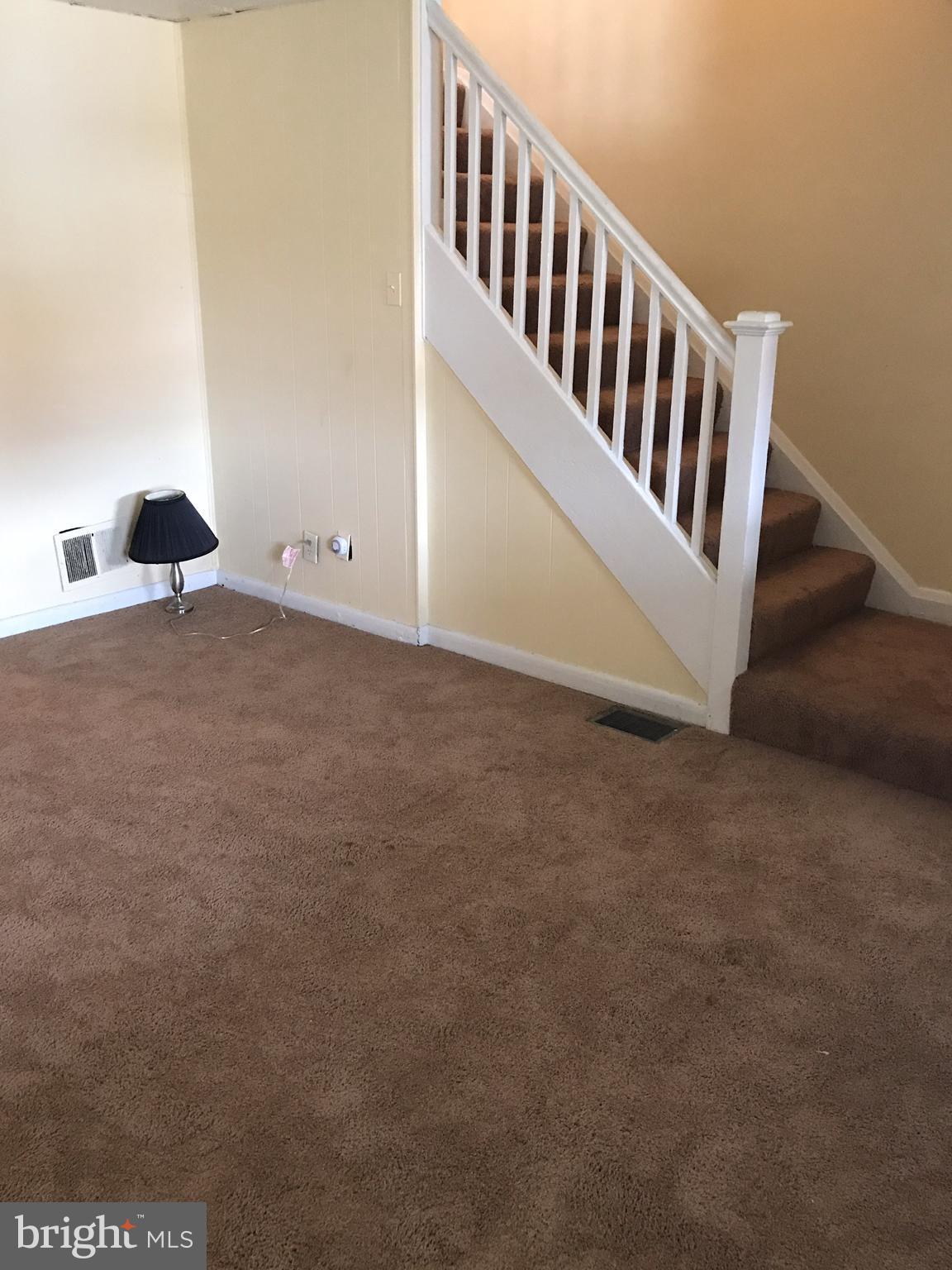 627 Cheraton Road Baltimore, MD 21225 - Photo 3 of 22 a view of wooden floor and staircase