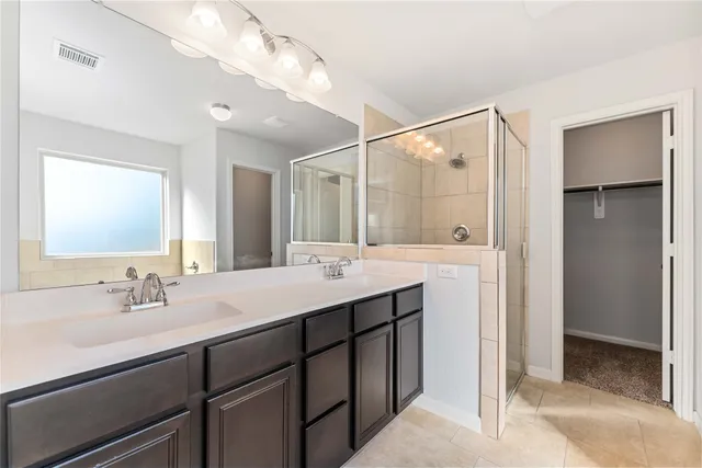 a white bath tub sitting in a bathroom