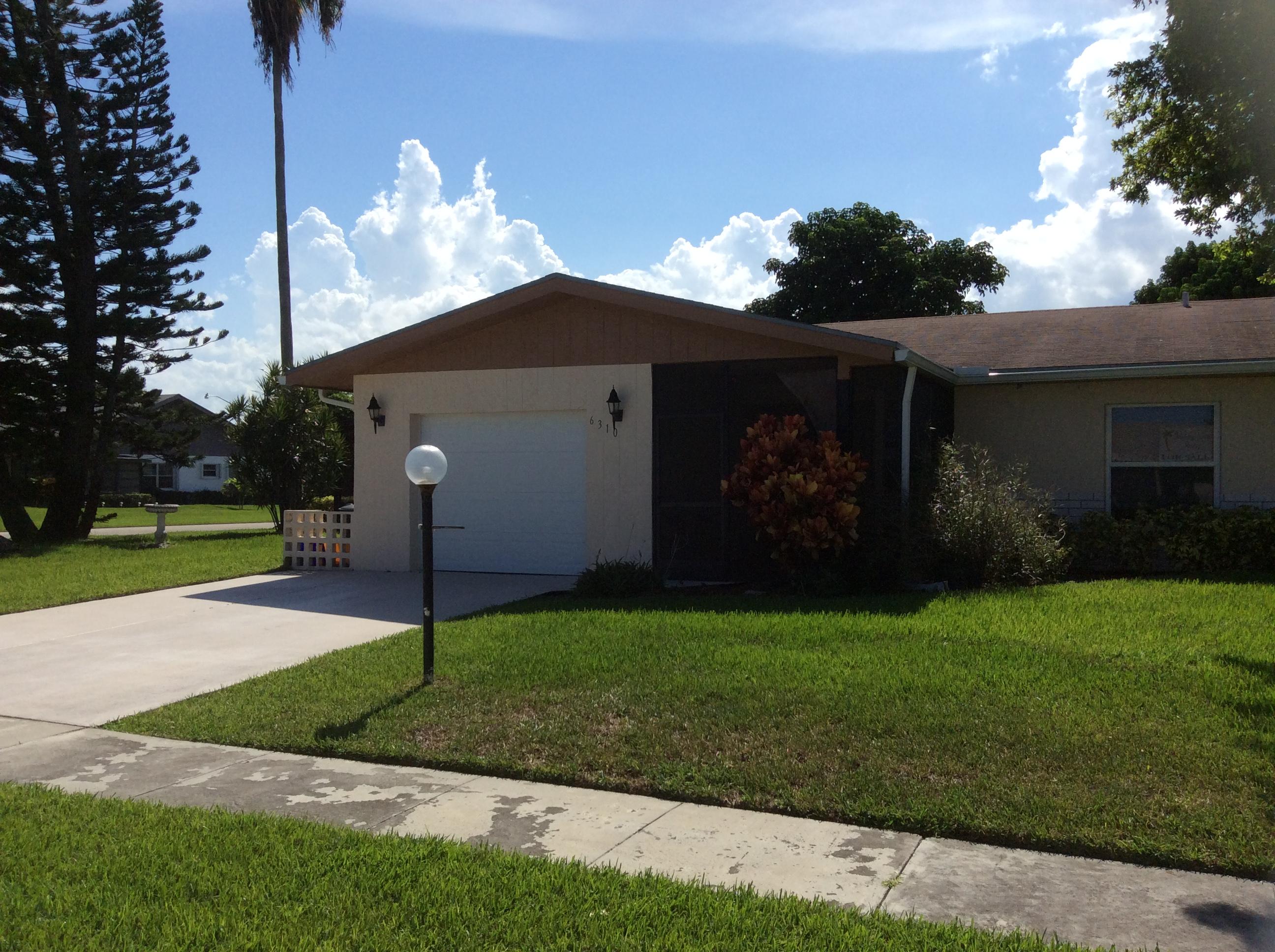 6310 Dusenburg Road Delray Beach, FL 33484 - Photo 1 of 15 FRONT VIEW