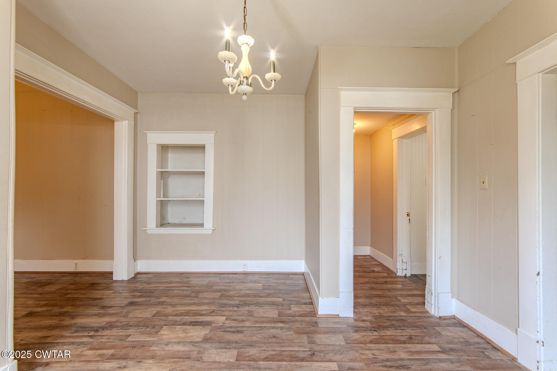 201 North Fairgrounds Street Jackson, TN 38301 - Photo 16 of 27 a view of empty room with wooden floor and fan