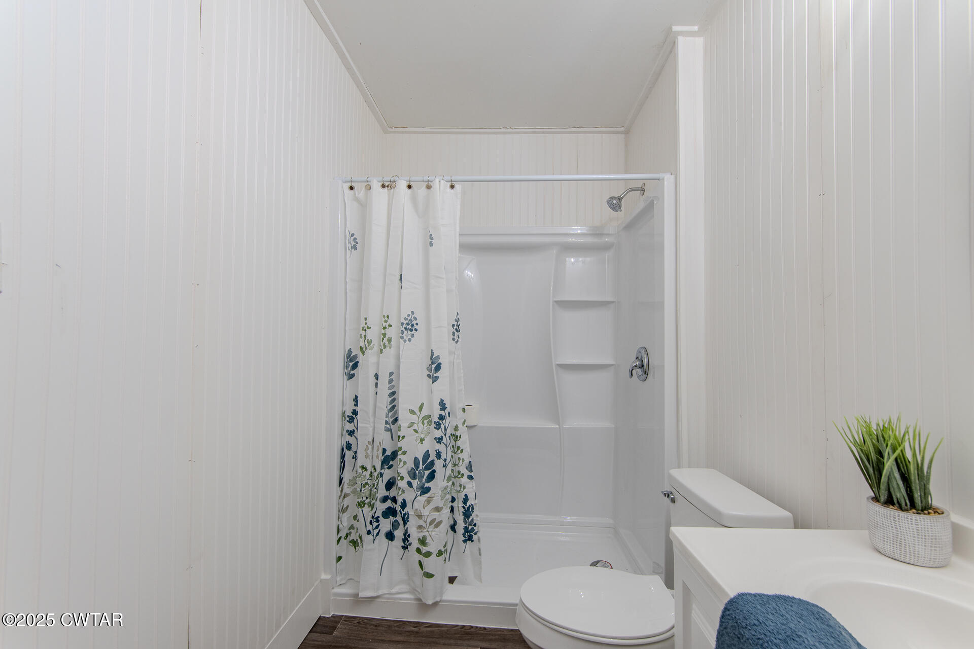 201 North Fairgrounds Street Jackson, TN 38301 - Photo 18 of 27 a bathroom with a toilet and a shower