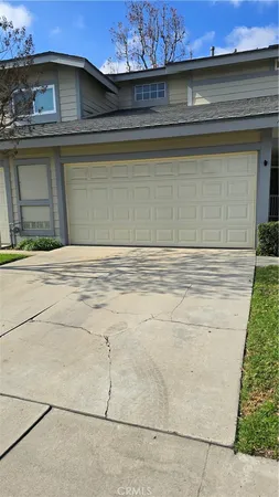 a view of a backyard of a house