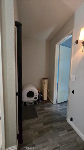 a bathroom with a sink and glass door