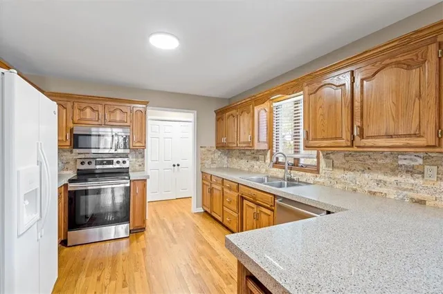 $415,000 | 2704 Bent Tree Circle, Lee's Summit, MO 64081