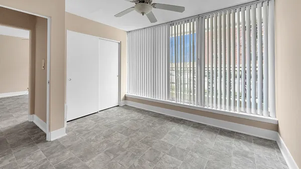 a view of an empty room with a window