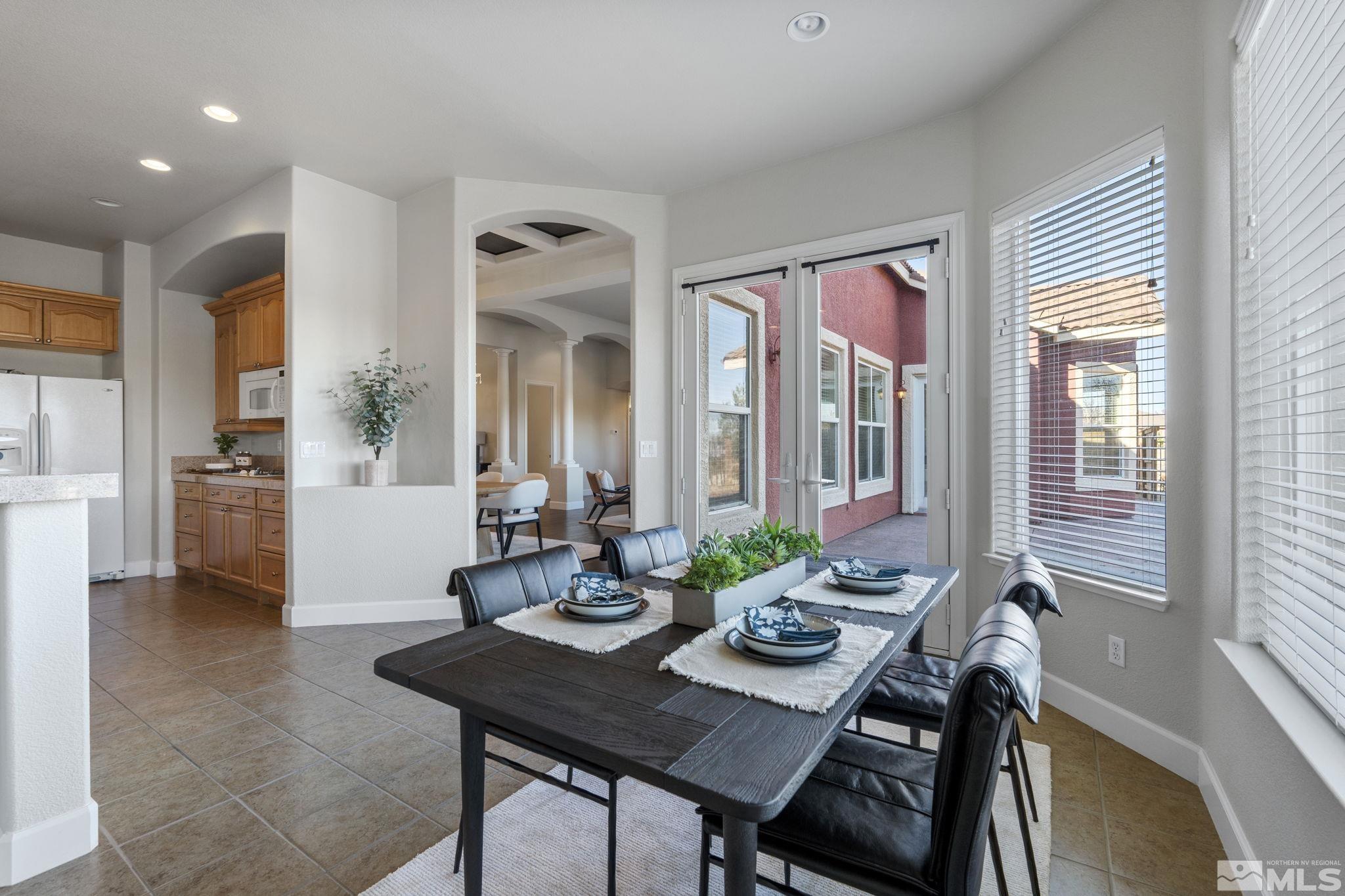 14760 Chateau Avenue Reno, NV 89511 - Photo 18 of 38 a view of a dining room with furniture and window