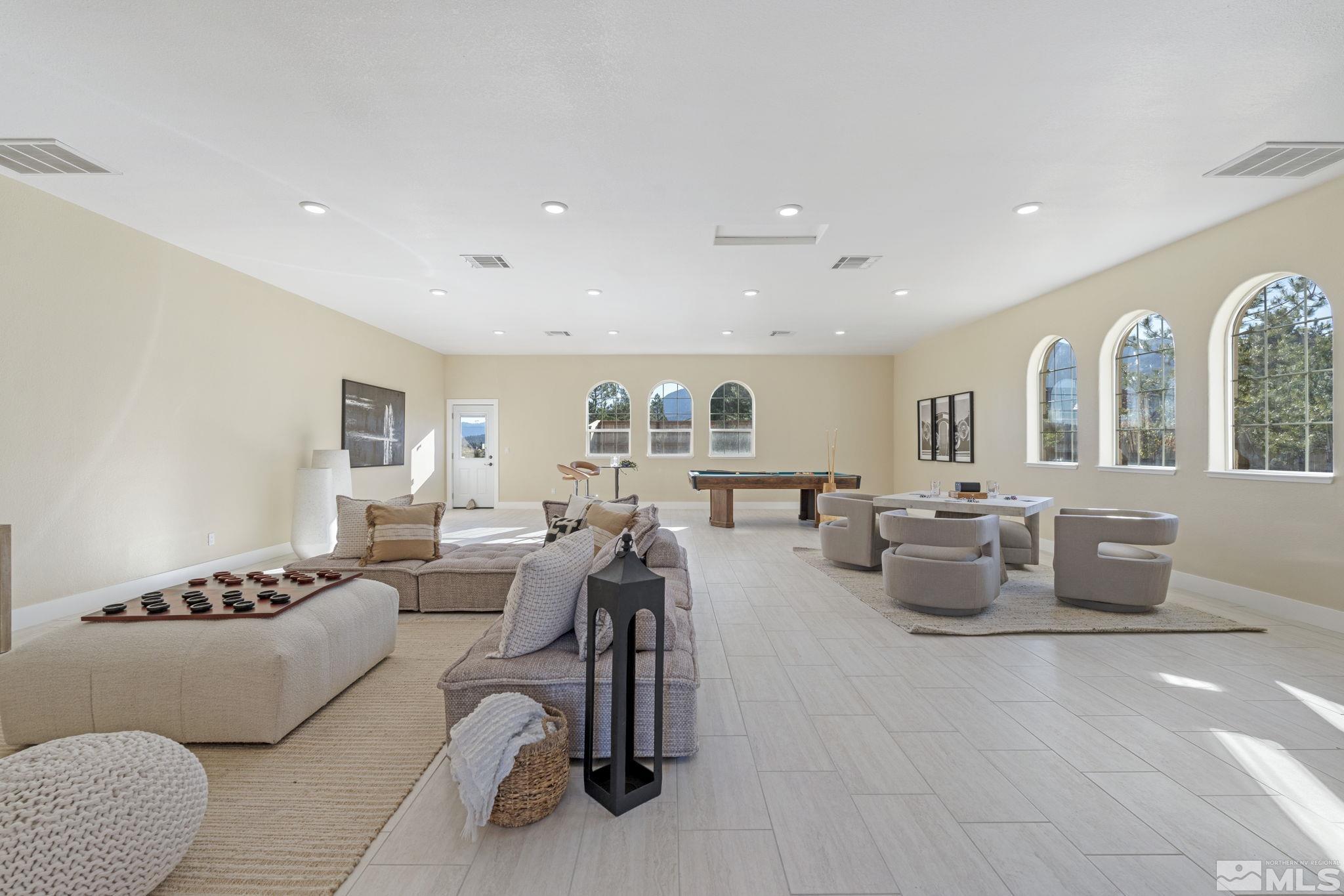 14760 Chateau Avenue Reno, NV 89511 - Photo 24 of 38 a living room with furniture and view of kitchen