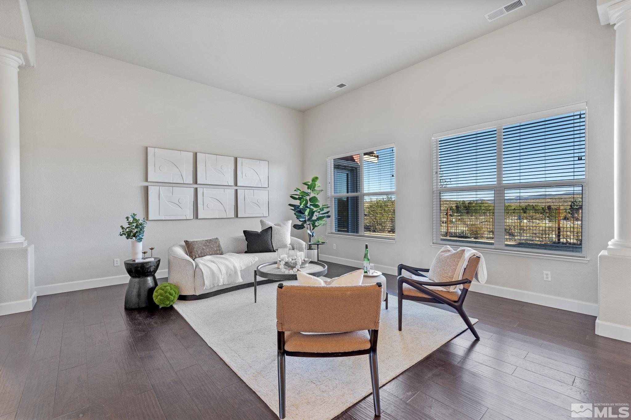 14760 Chateau Avenue Reno, NV 89511 - Photo 6 of 38 a living room with furniture and a painting on the wall