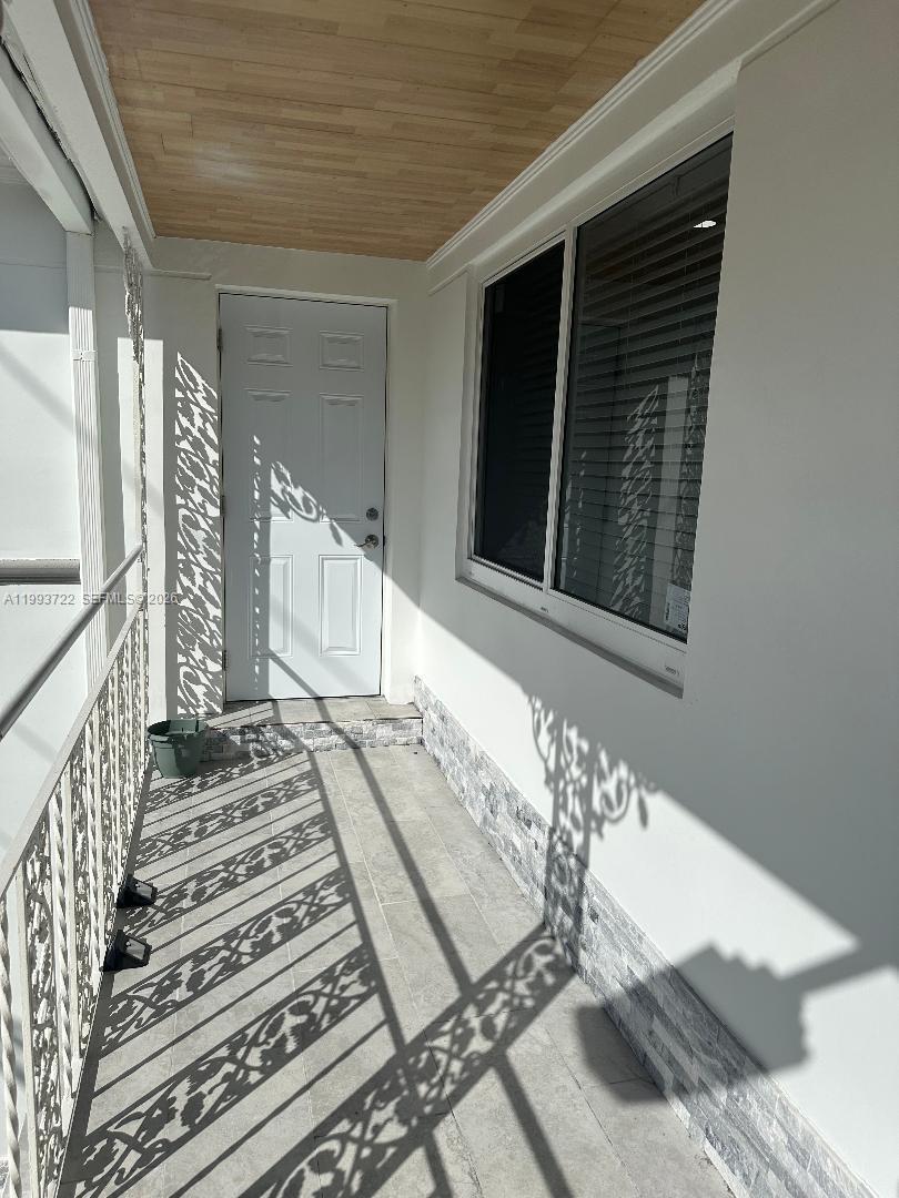 7115 Rue Granville, Unit D Miami Beach, FL 33141 - Photo 12 of 13 a view of a balcony