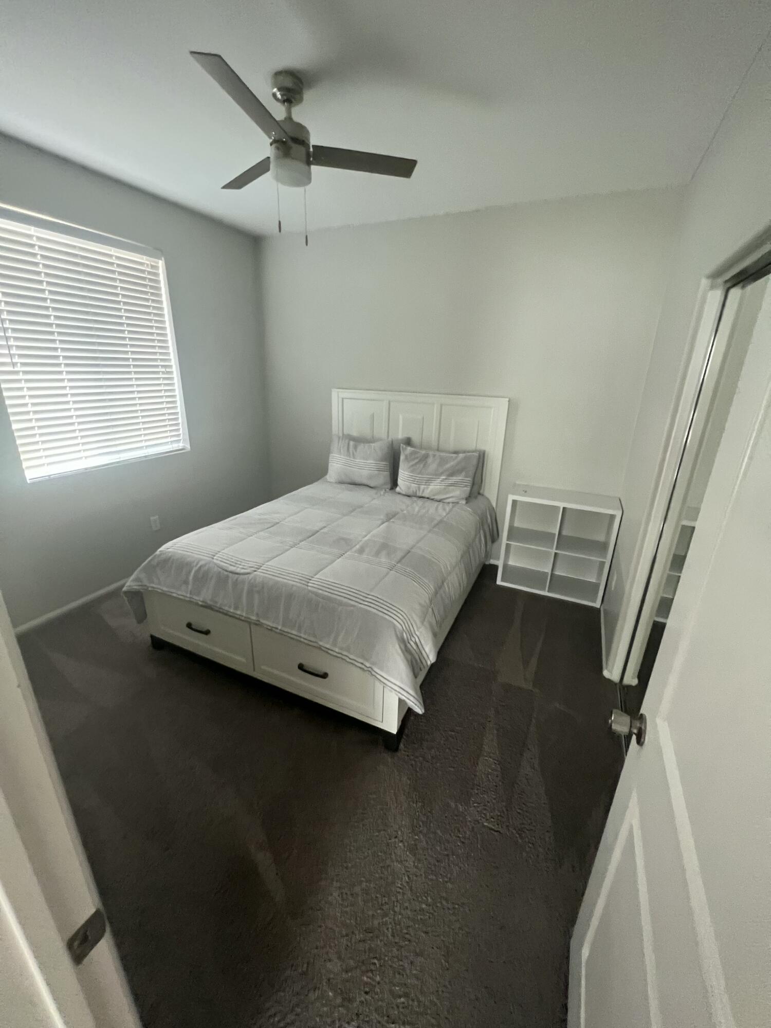 82798 Longfellow Court Indio, CA 92201 - Photo 15 of 15 a bedroom with a bed and a window