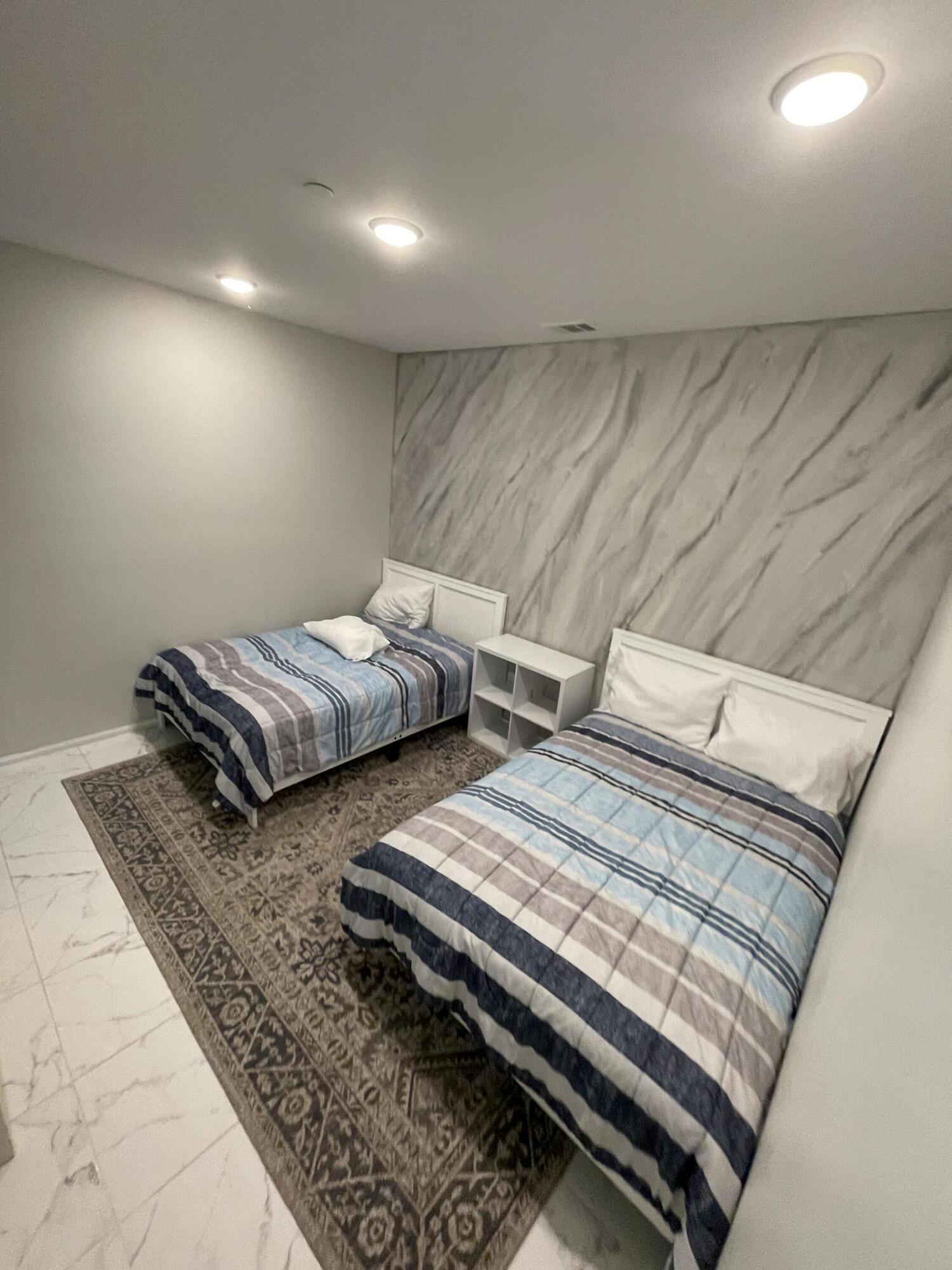 82798 Longfellow Court Indio, CA 92201 - Photo 9 of 15 a couple of benches sitting in a room