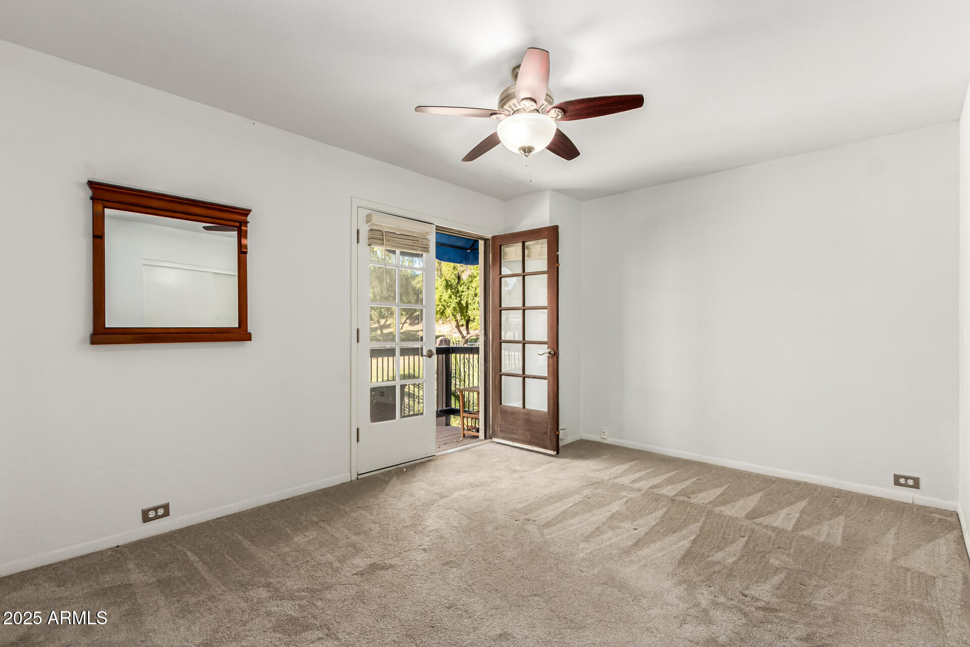 8445 South 48th Street, Unit 2 Phoenix, AZ 85044 - Photo 12 of 32 a view of an empty room with a window