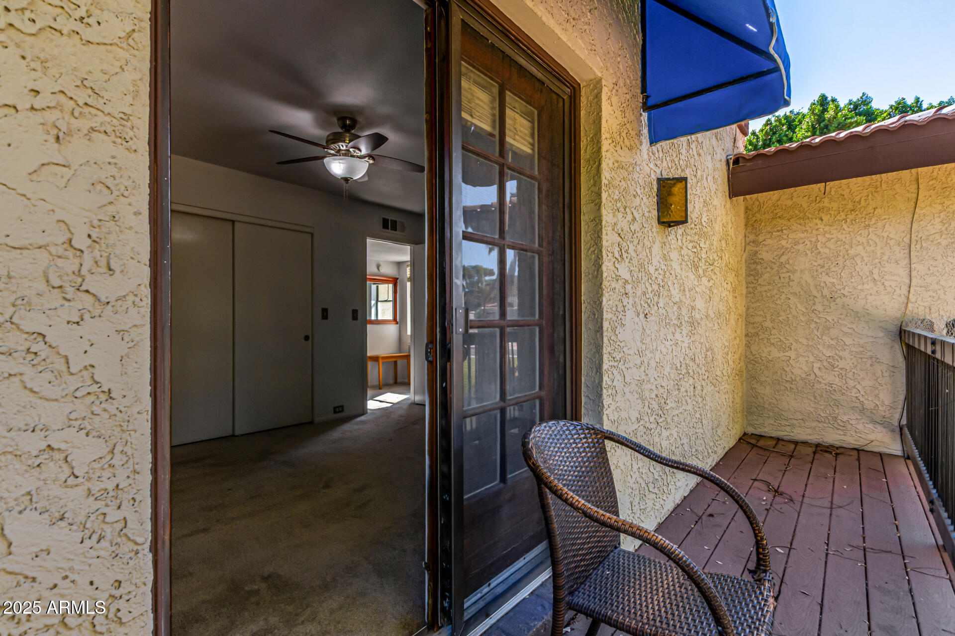 8445 South 48th Street, Unit 2 Phoenix, AZ 85044 - Photo 21 of 32 a view of a hallway with wooden floor and staircase