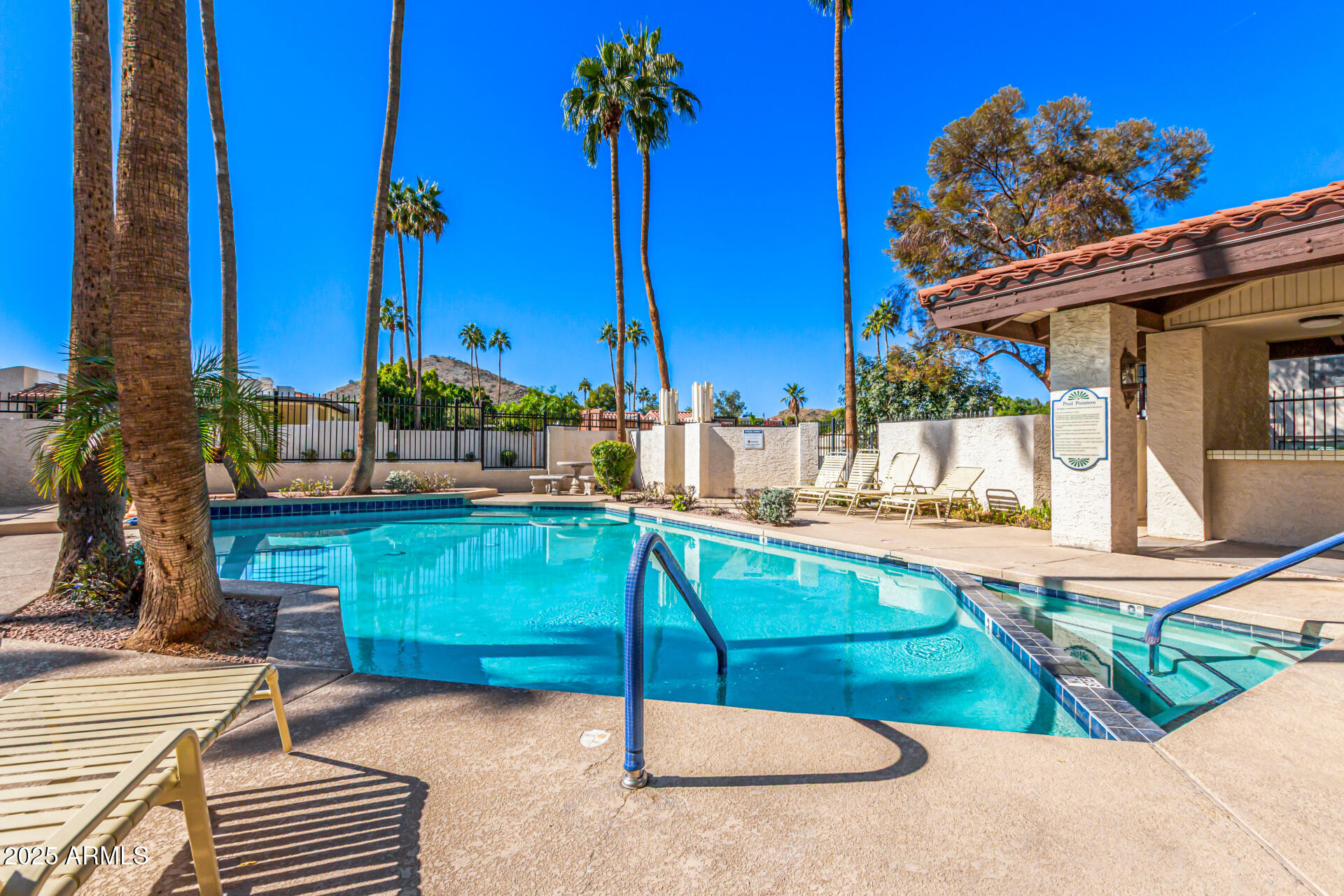 8445 South 48th Street, Unit 2 Phoenix, AZ 85044 - Photo 31 of 32 a view of a swimming pool with a patio
