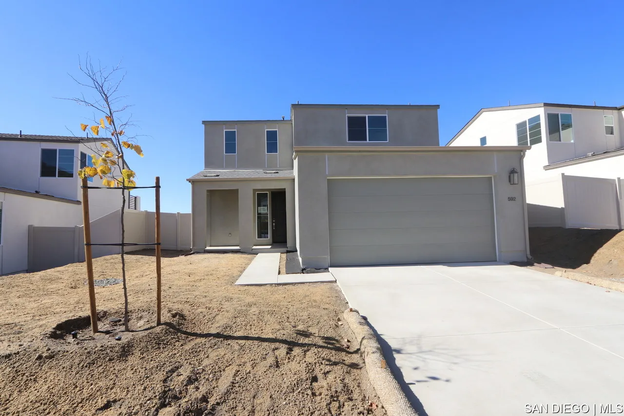 a house view with a outdoor space