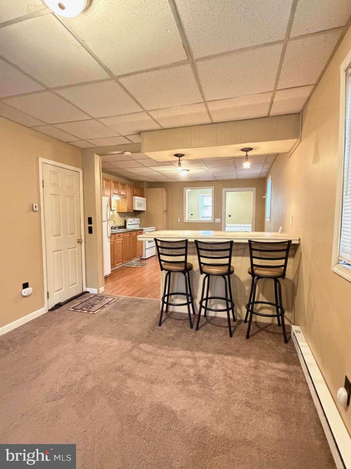 226 West Ridge Street Coaldale, PA 18218 - Photo 11 of 33 a view of a livingroom with furniture and a window