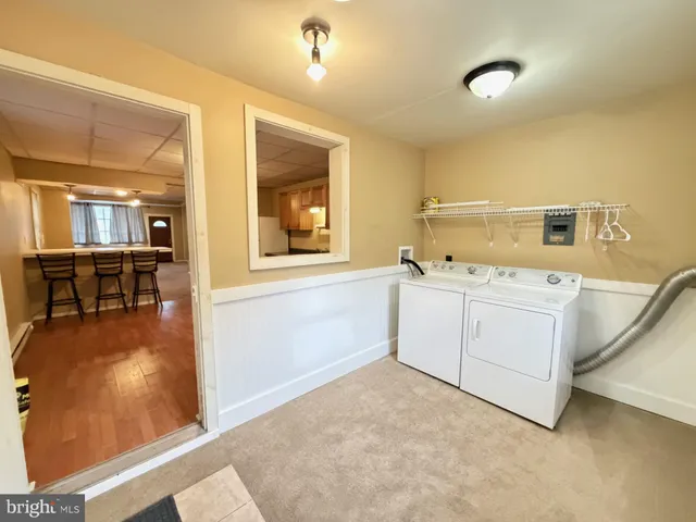 a view of a kitchen with a sink