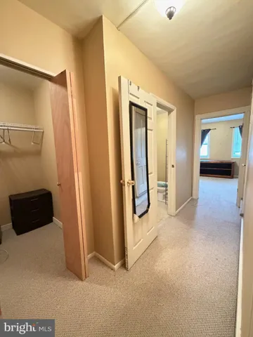 a view of a closet in a room