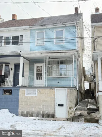 a front view of a house with entertaining space