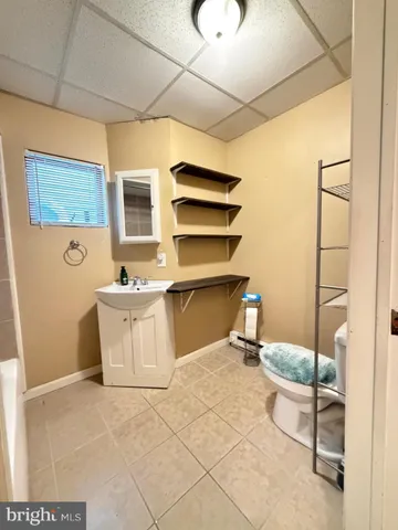 a room with table chair and dryer