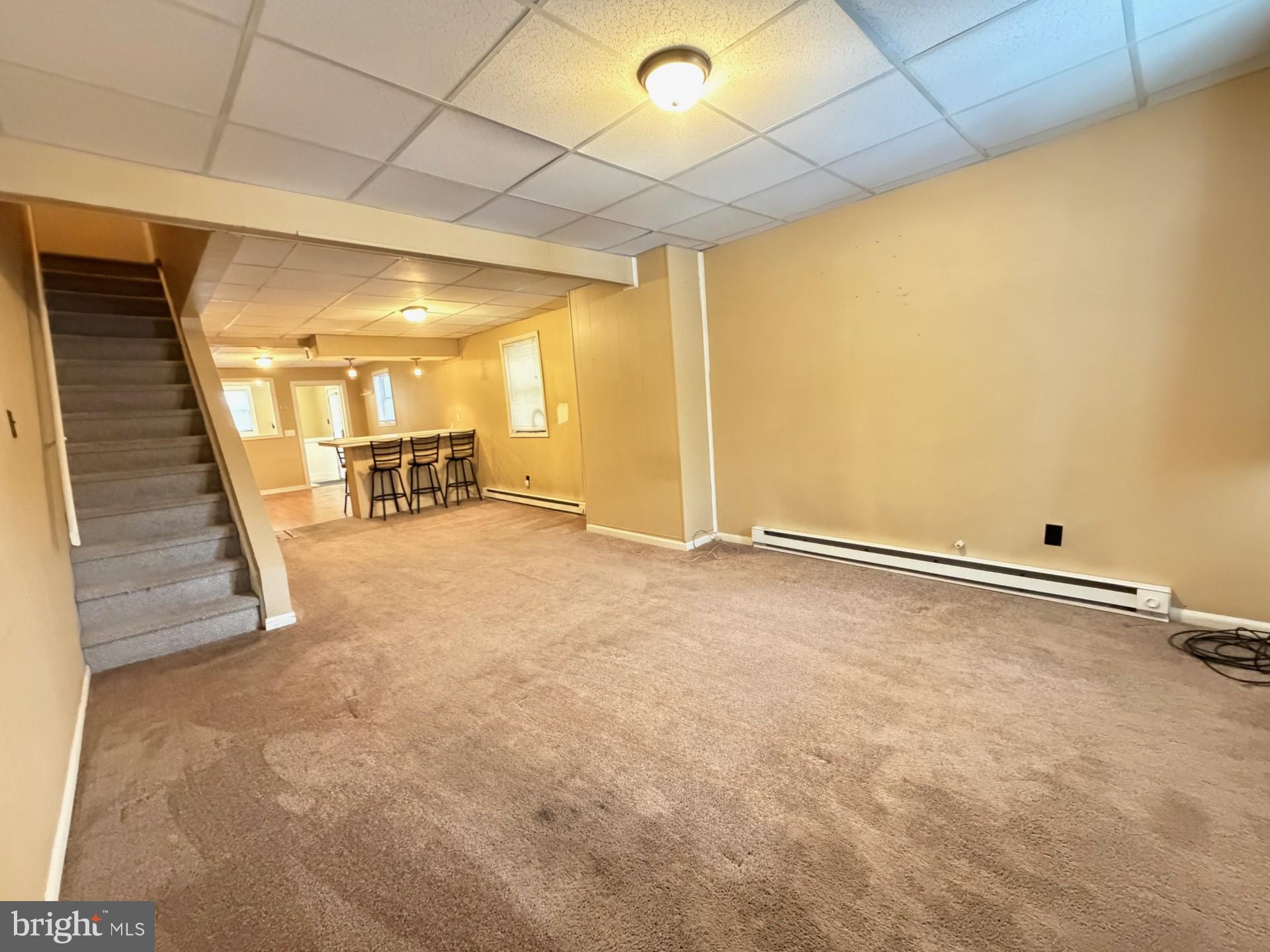 226 West Ridge Street Coaldale, PA 18218 - Photo 5 of 33 a view of a room with stairs and a window