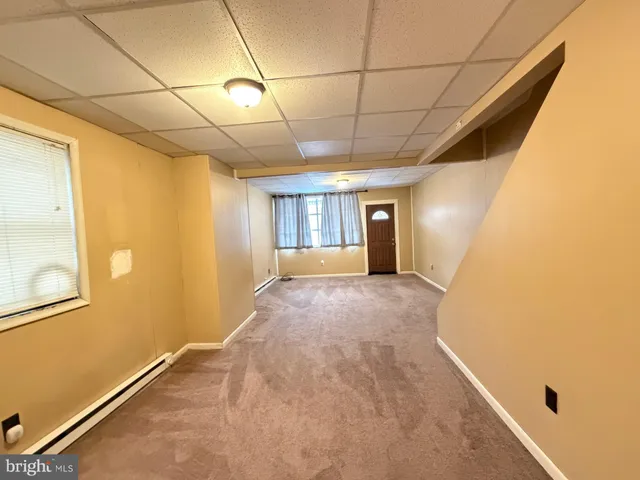 a view of hallway with windows