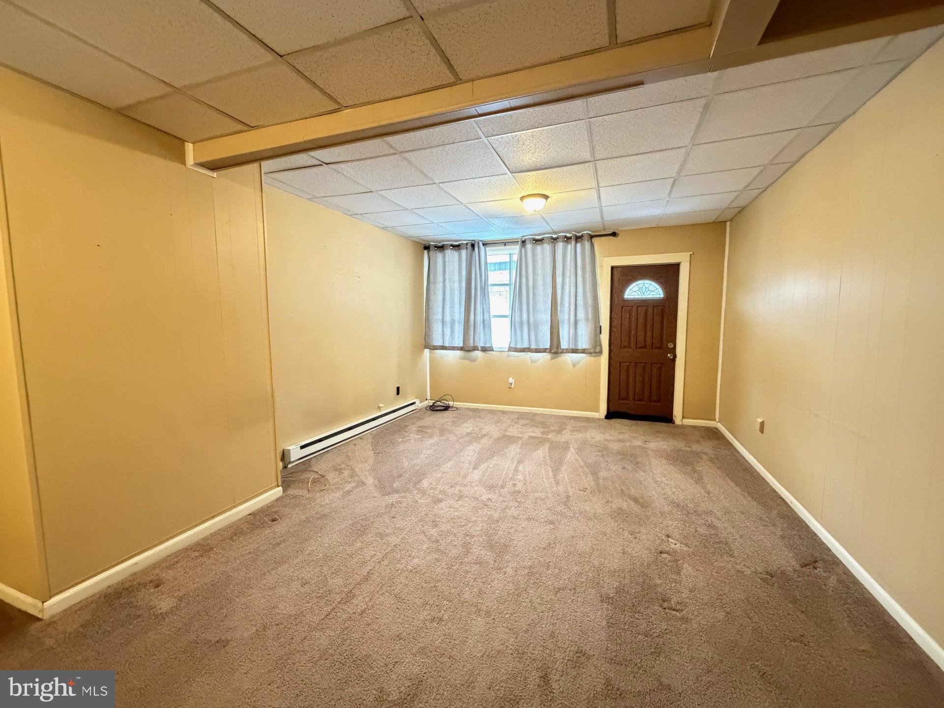 226 West Ridge Street Coaldale, PA 18218 - Photo 8 of 33 a view of an empty room with a window