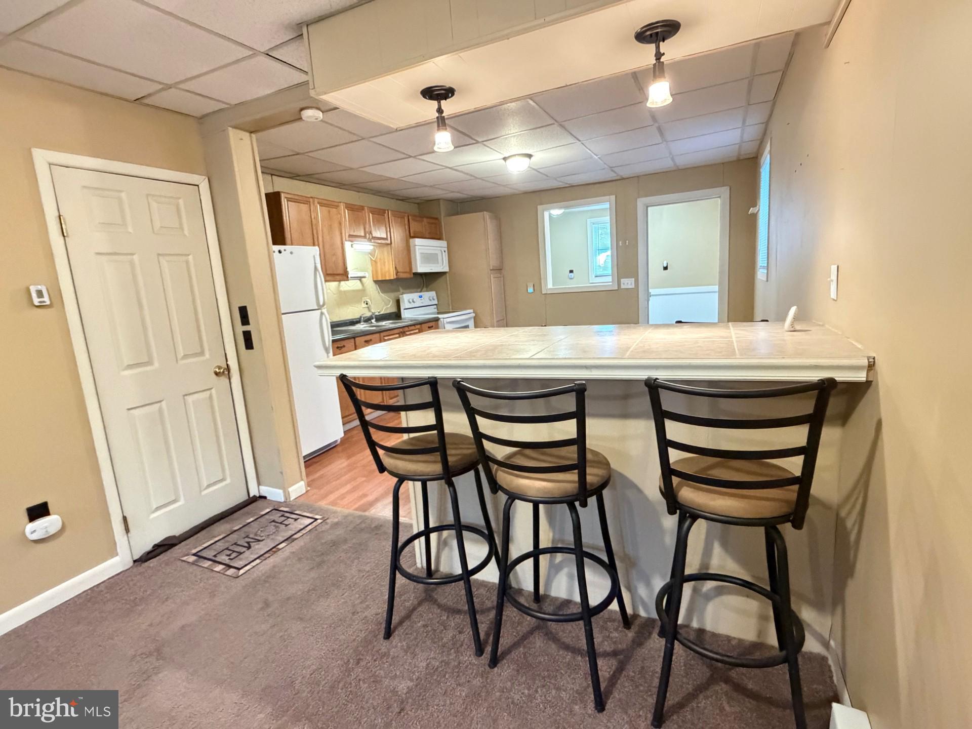 226 West Ridge Street Coaldale, PA 18218 - Photo 10 of 33 a view of a dining room with furniture and a chandelier
